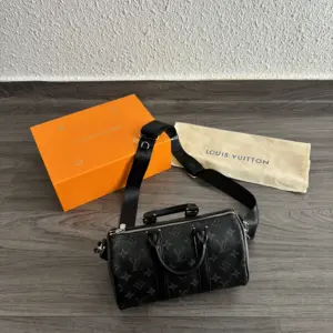 Lv Keepall Bandoulière