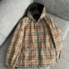 Burberry Veste à capuche réversible à carreaux